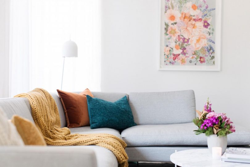 The right artwork will make your living room pop with vitality.