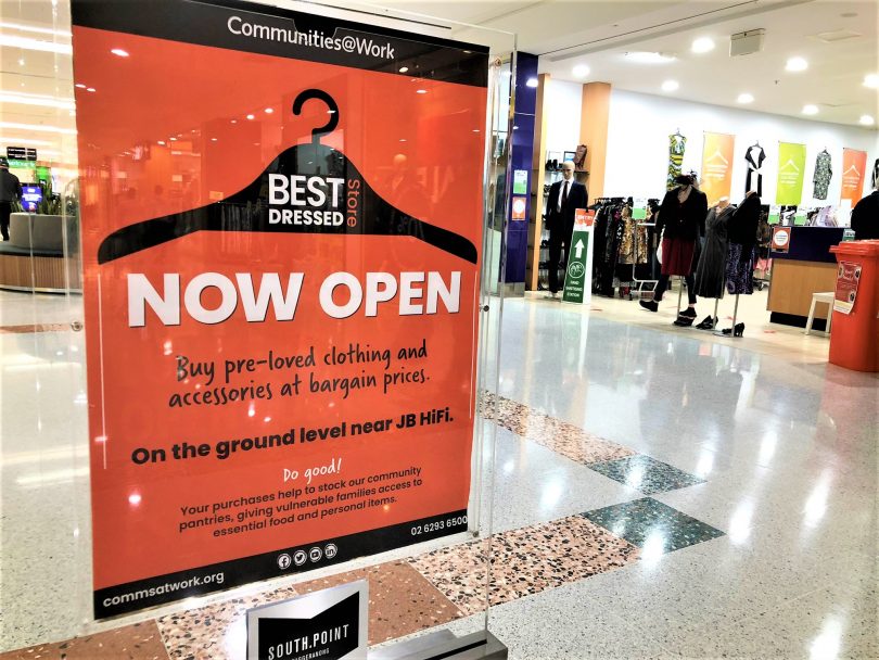 'Now open' sign at Communities@Work’s Best Dressed Store in Tuggeranong.