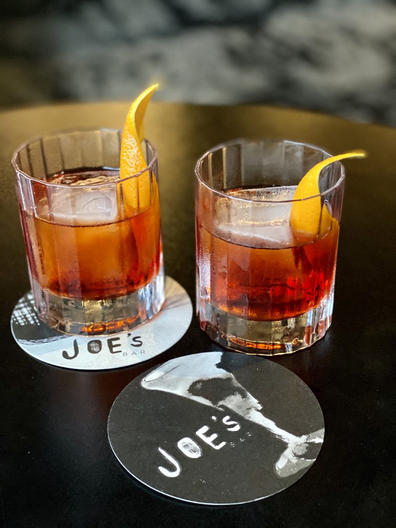 Two glasses of the Canberra Native Negroni at Joe's Bar.