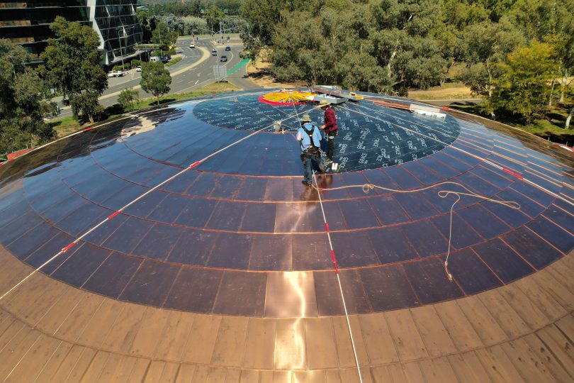 Workers restoring Shine Dome roof