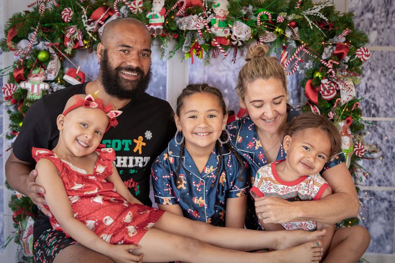 Kristy Giteau and Soakai, with their three children in December 2020. Photo: Supplied.