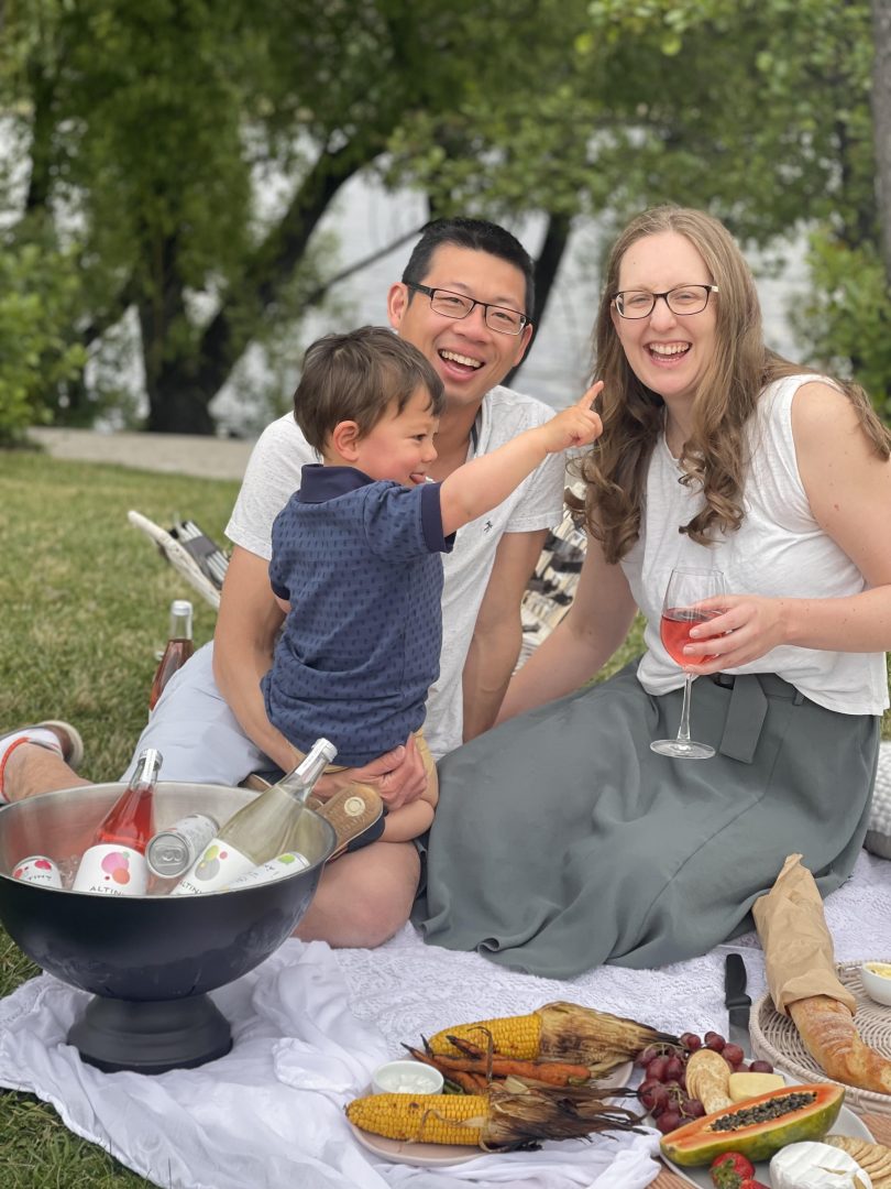 Alan Tse, ollie and Christina DeLay at a picnic in the park