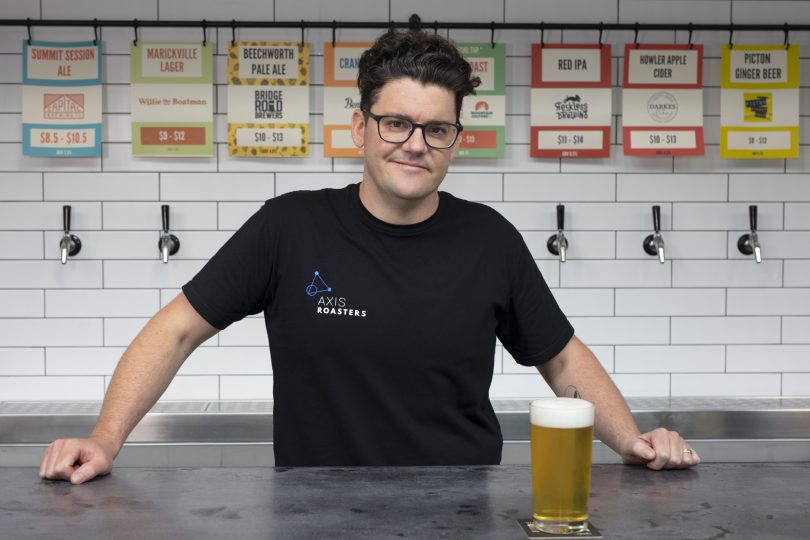 Barman with a beer