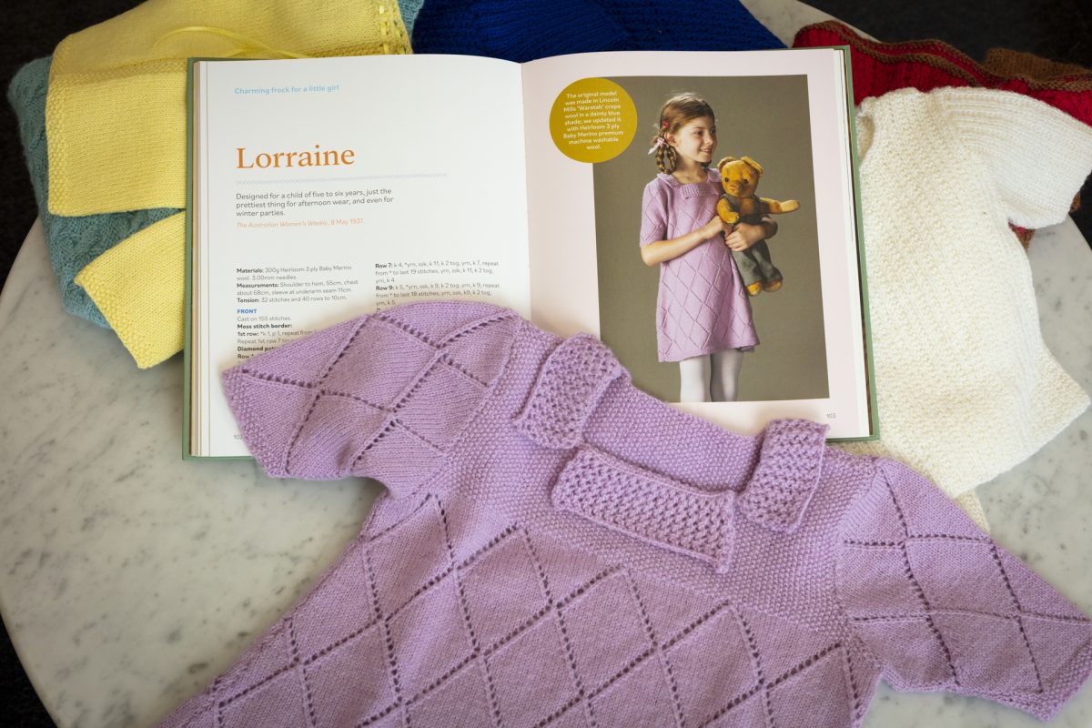 Knitted jumper and book