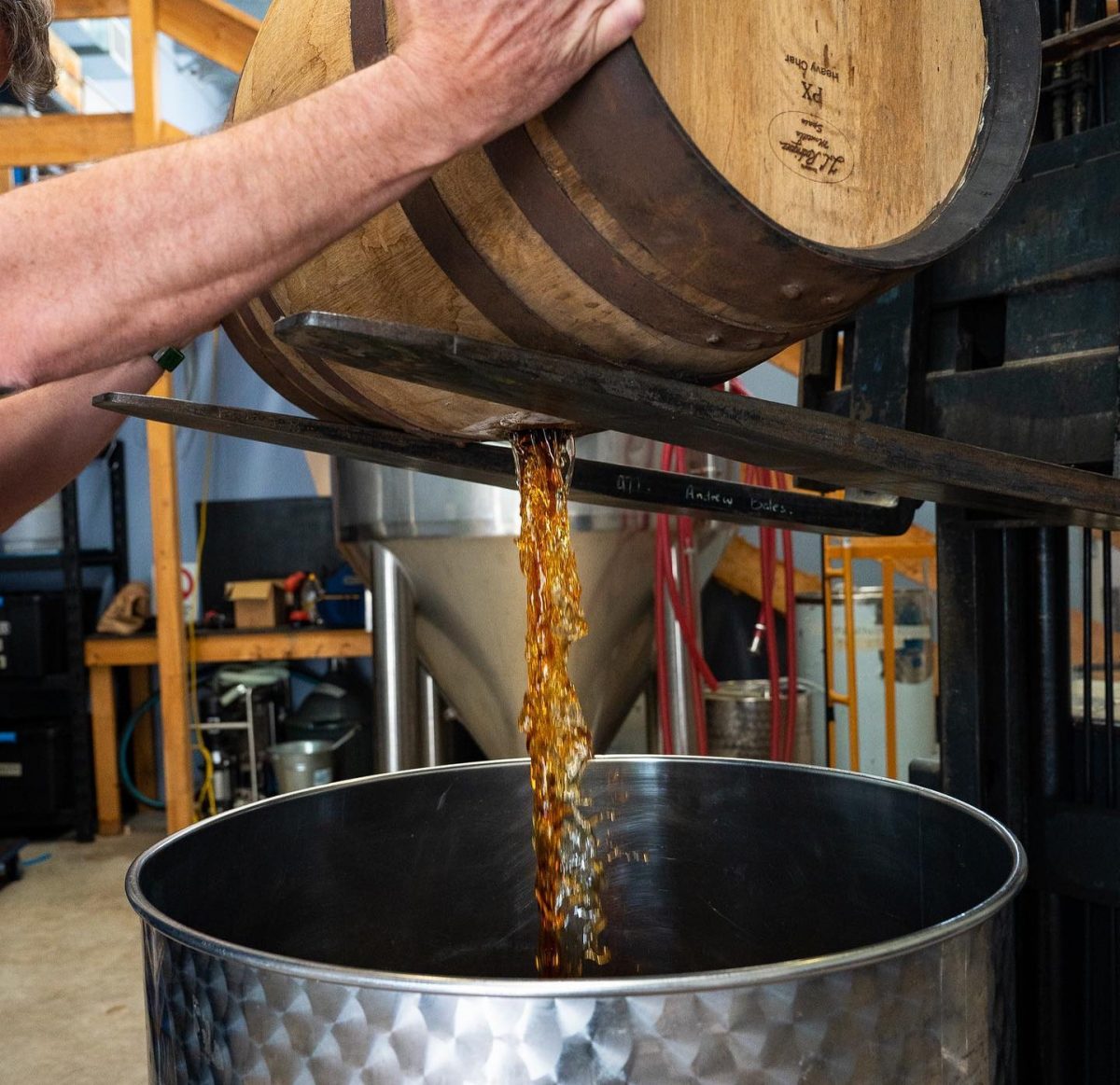 Whisky pouring from a barrel
