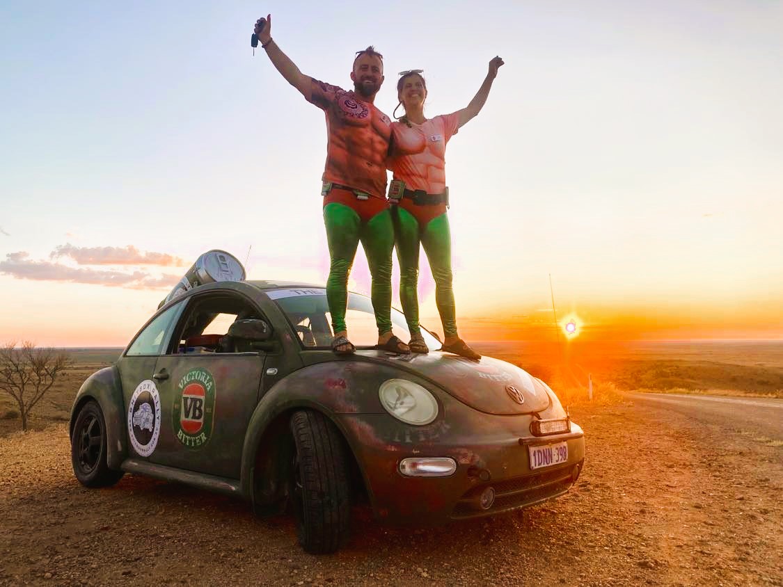 Tom Corra and Juli Darduin atop the 'VBeetle' in the Australian outback.