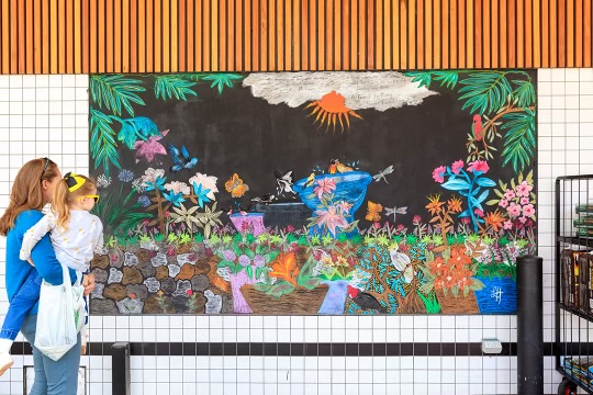 The mural at the Cook Grocer store is popular with locals. Photo: Supplied.