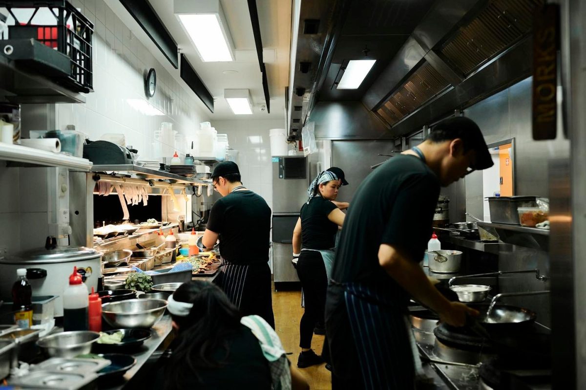 Morks Restaurant's kitchen staff preparing orders.