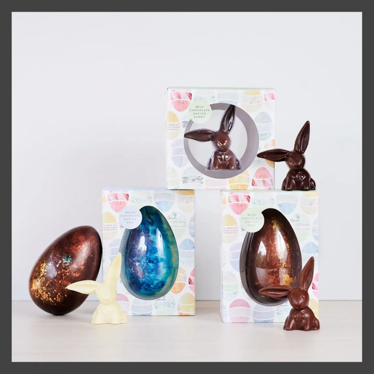 Display of chocolate eggs and bunnies.