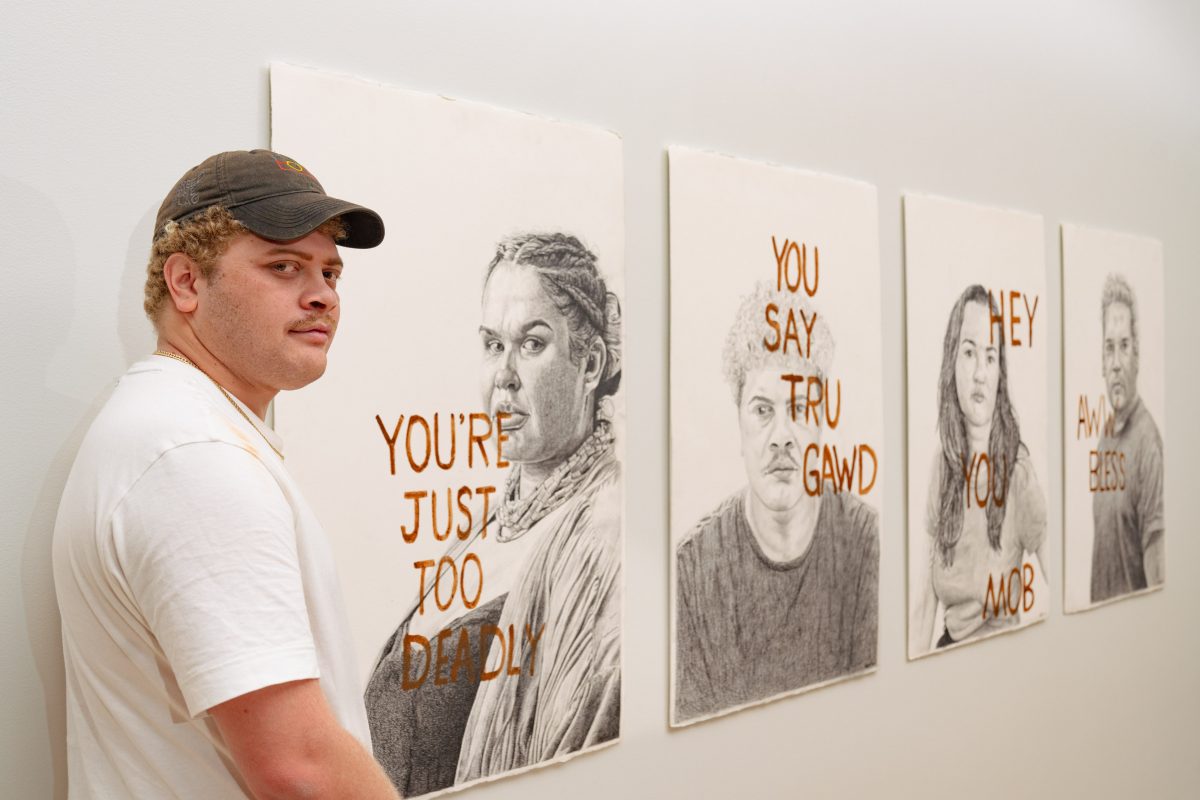 Dylan Mooney with his works in the Portrait23 exhibition at the National Portrait Gallery