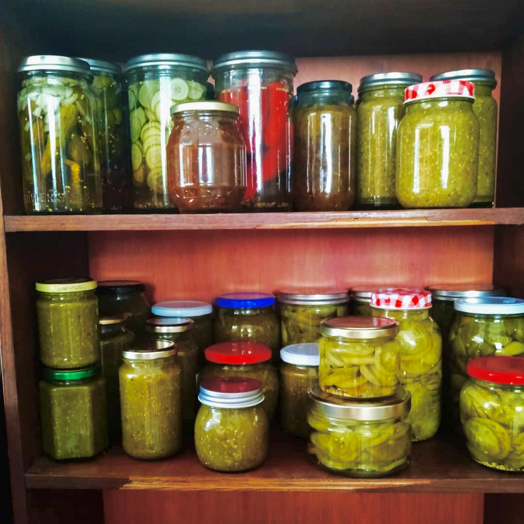 jars of pickles on a shelf