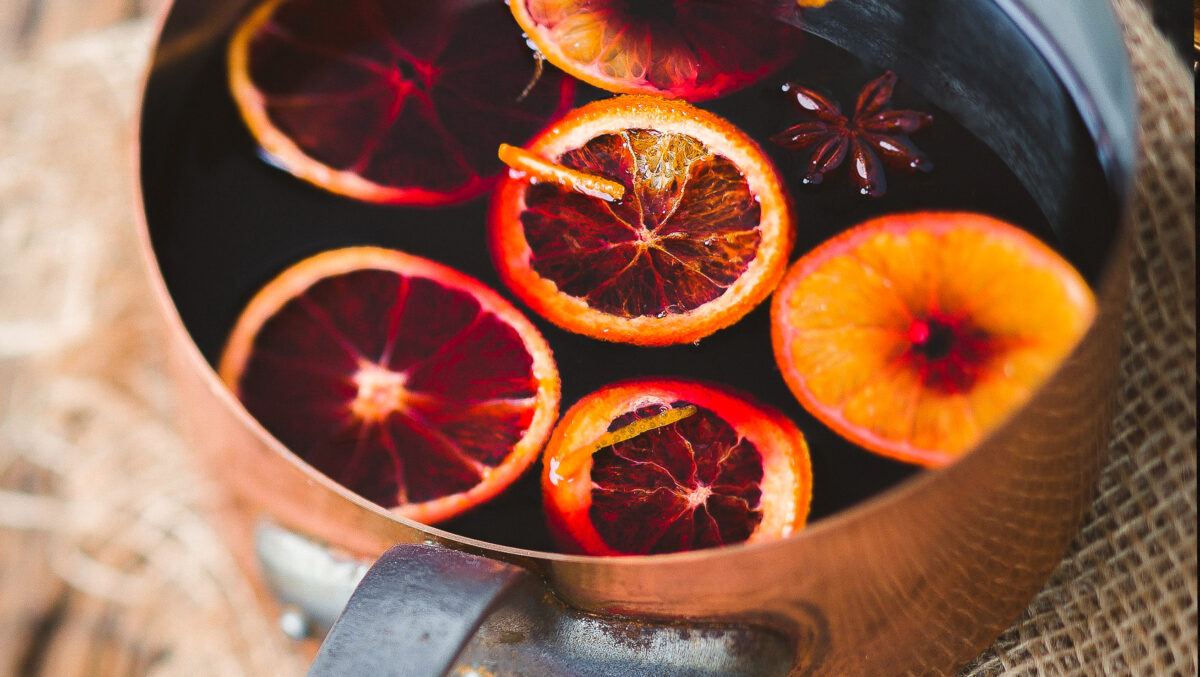 mulled wine with orange slices and cinnamon.