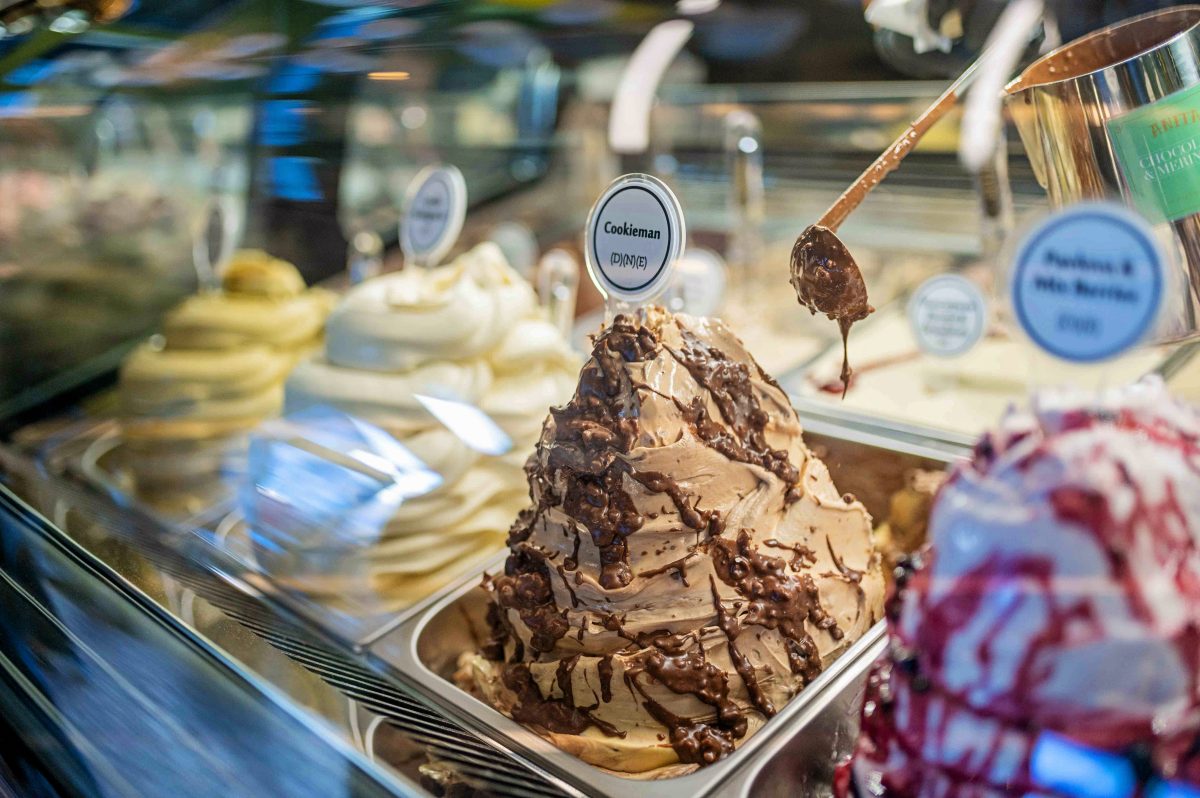 crunchy nutella sauce being dripped over the gelato