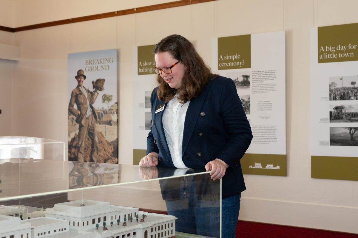 Alice McKenzie Ebbels looks at a display at the Museum of Australian Democracy.