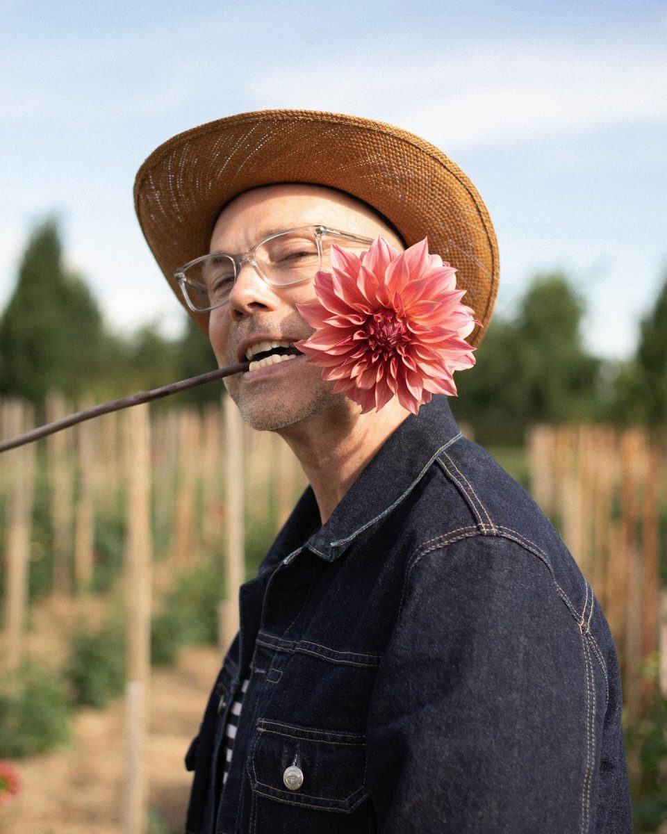 Man with flower in his mouth