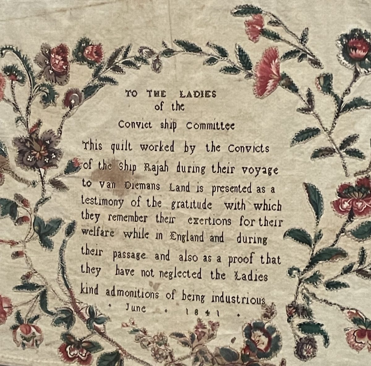 Close-up of dedication on quilt