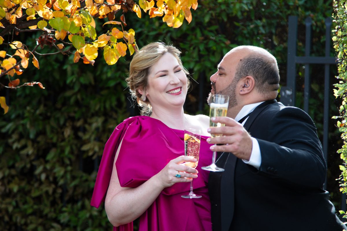 Man and woman holding champagne glasses