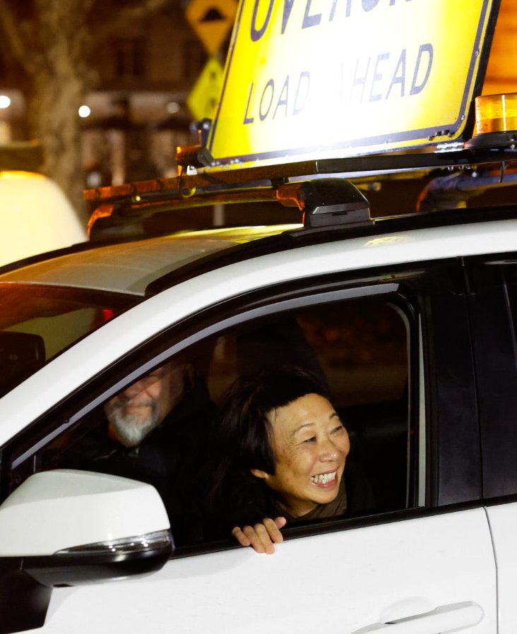 Woman smiling in car