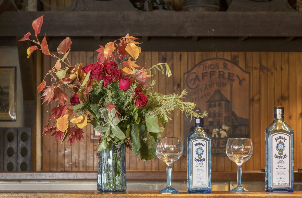 bombay sapphire vase with flowers