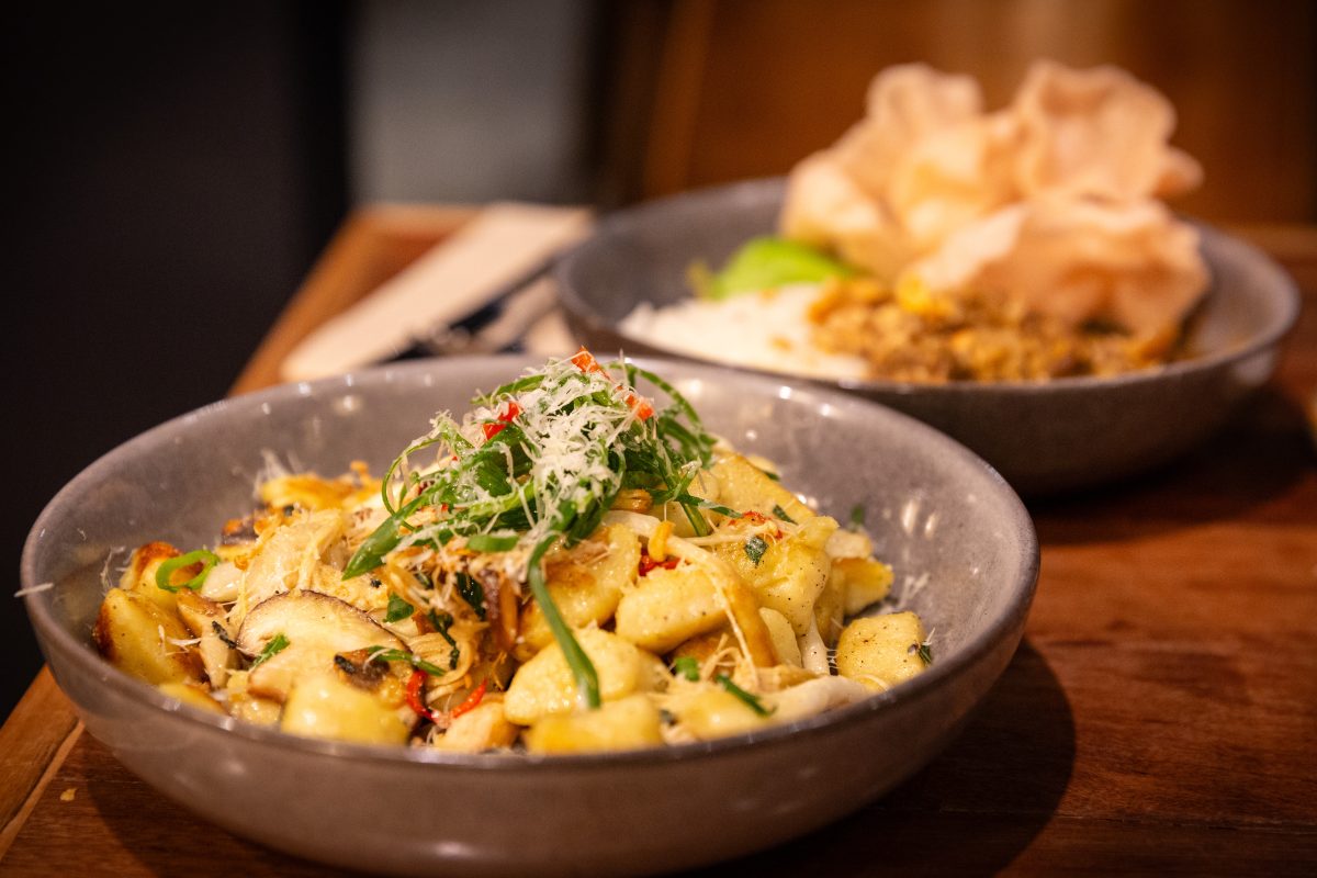 House made gnocchi with assorted wild mushrooms, sage, pecorino, truffle oil, finished with lemon zest. At The Denman Kitchen + Wine Bar.