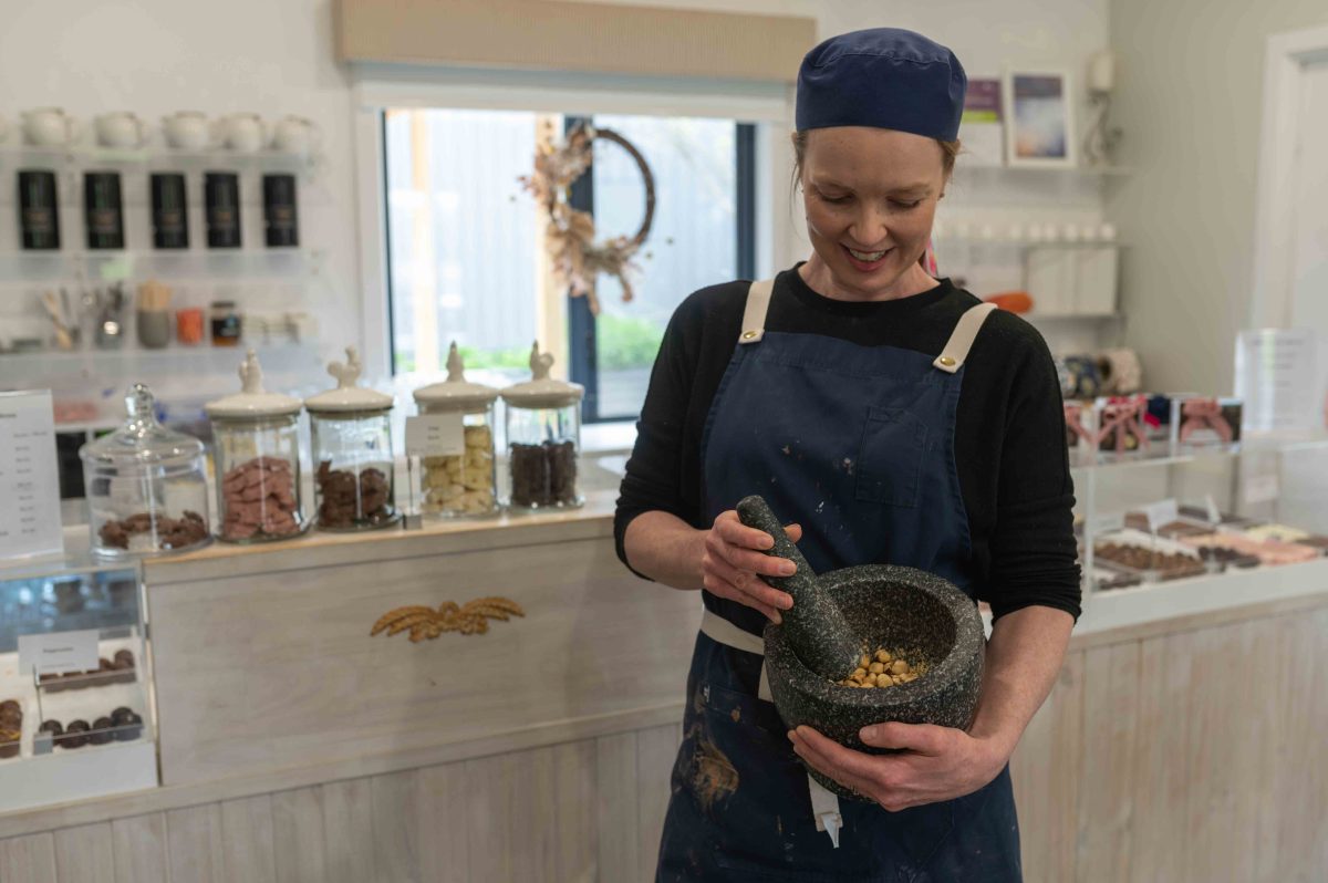 woman crushing nuts