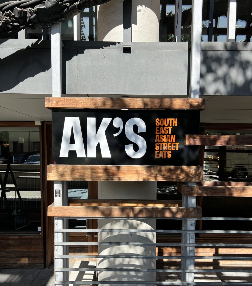 Exterior of restaurant with sign reading AK's South East Asian Street Eats