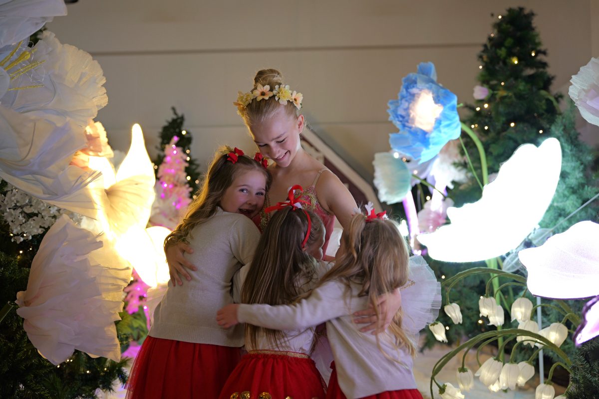 four children hugging