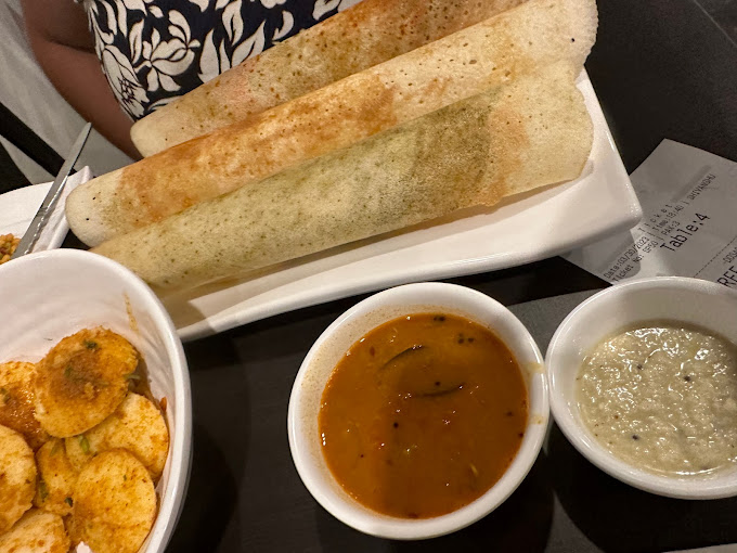 three dosas with sides