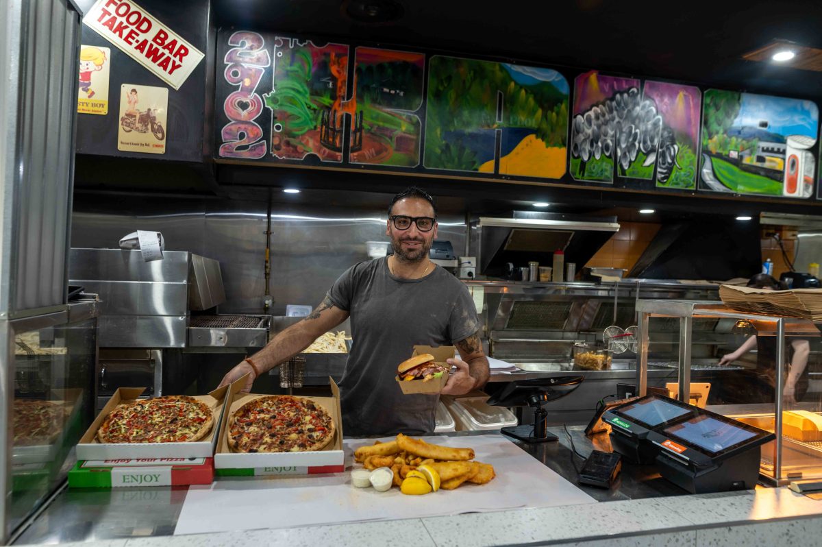 man behind counter