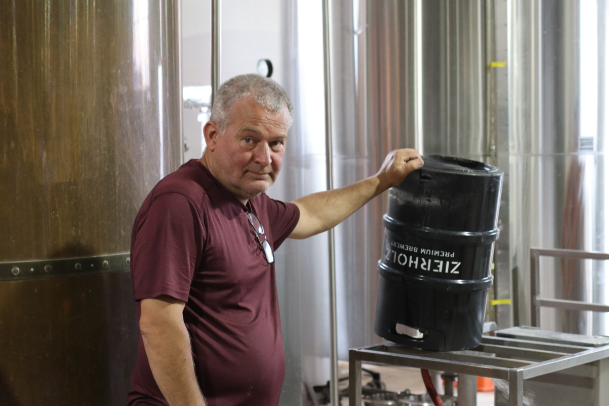 man with beer barrel