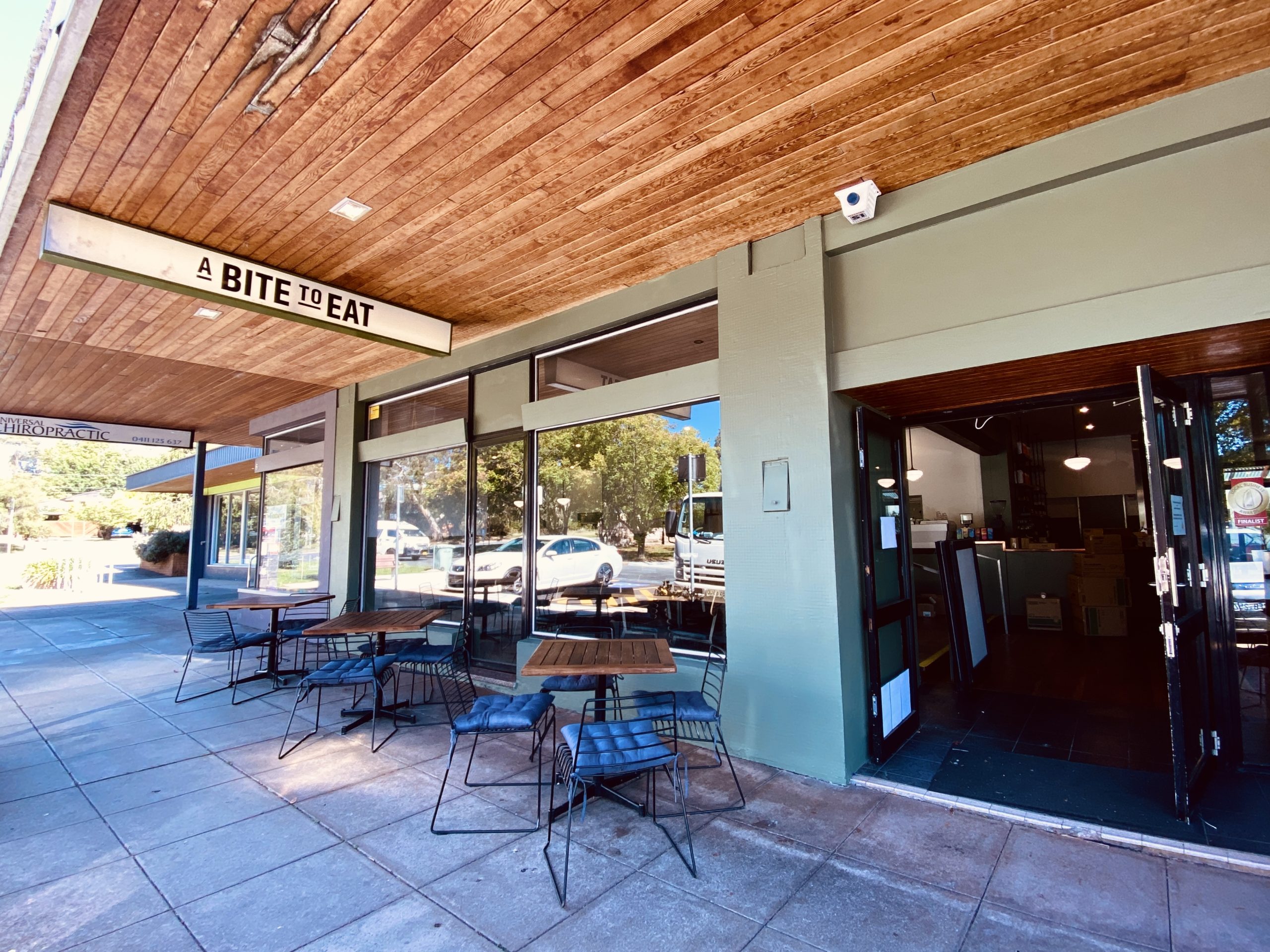 Exterior of cafe with sign reading A Bite to Eat