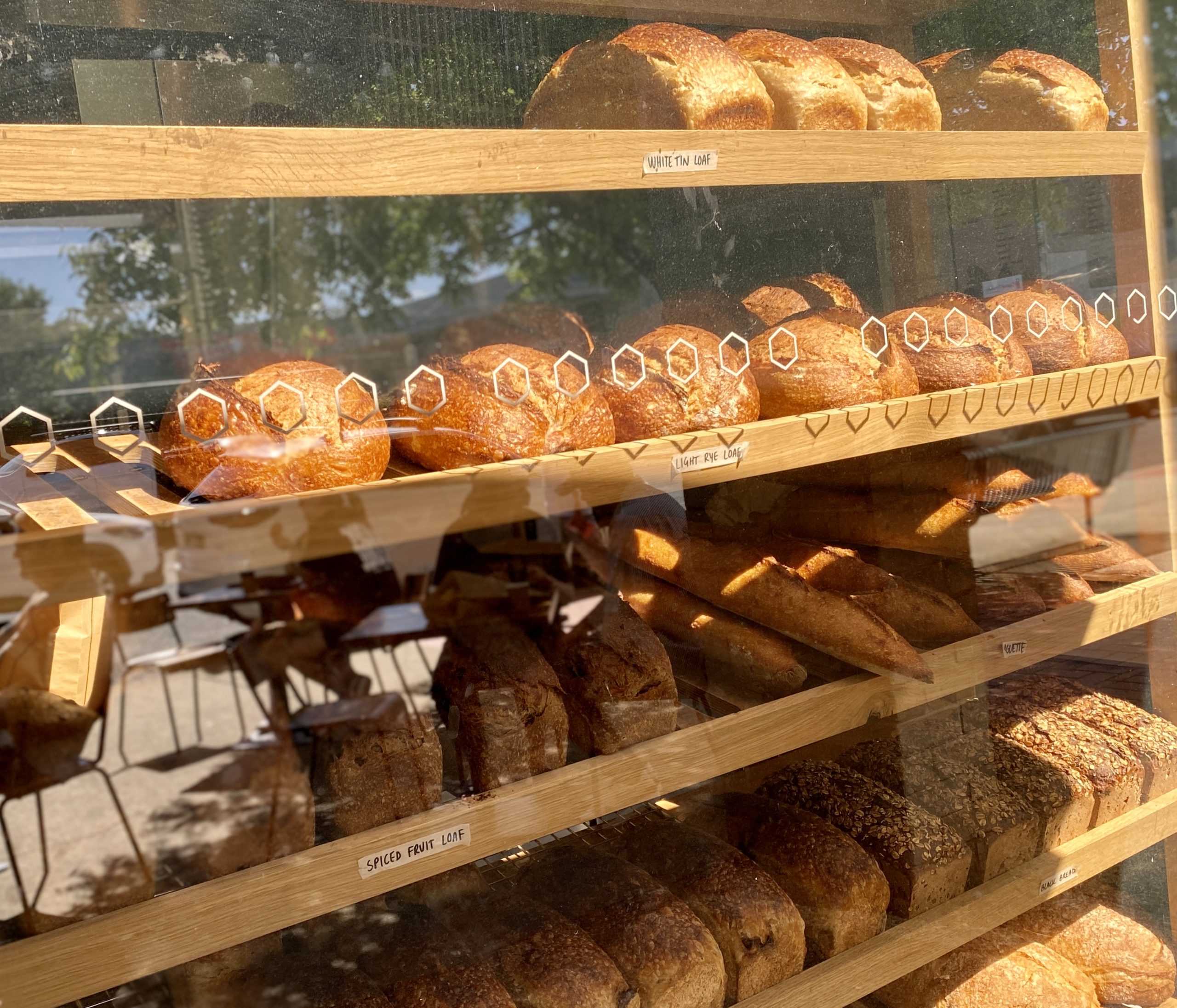 Rows of bread on a shelf