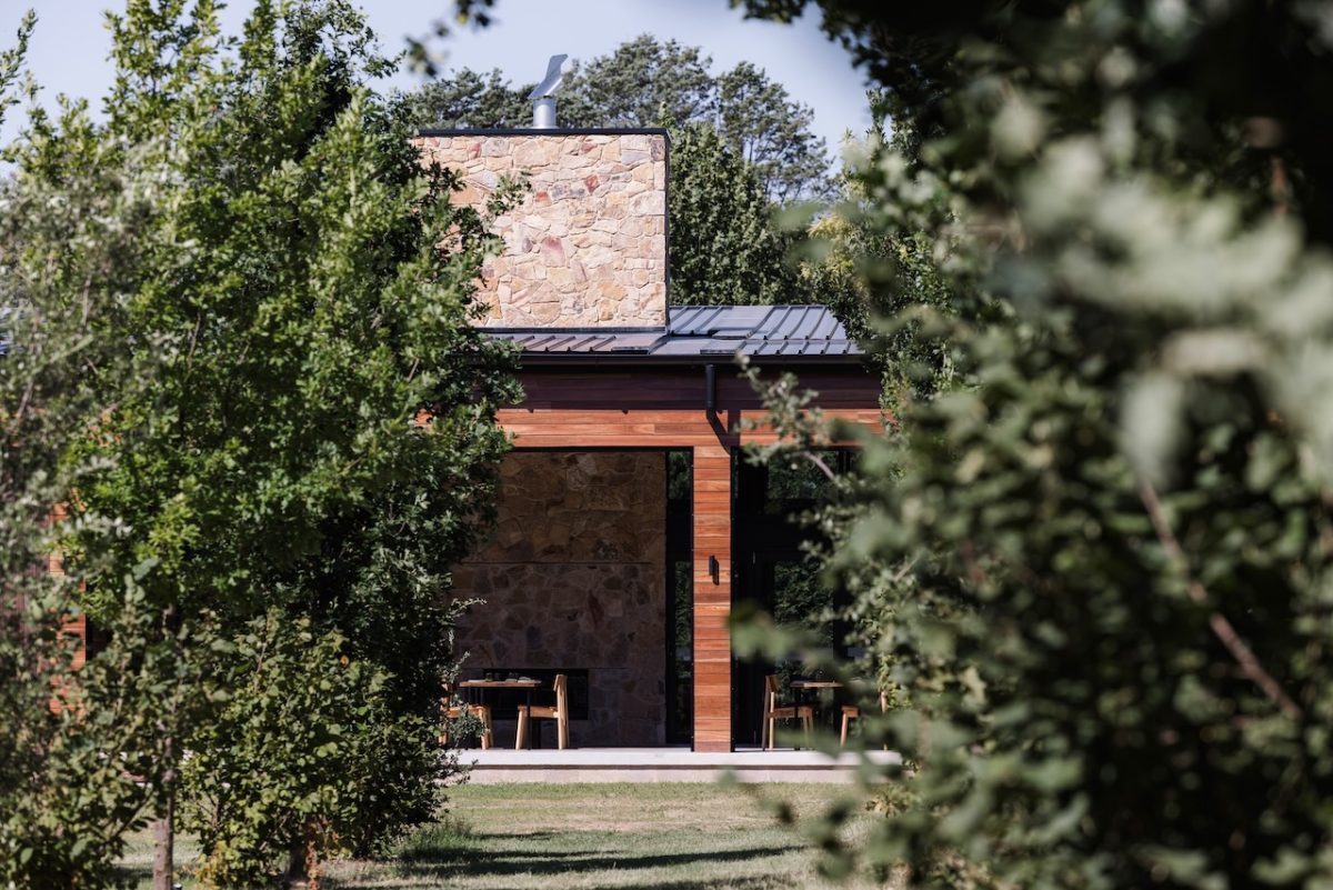 A view of the restaurant from between the trees