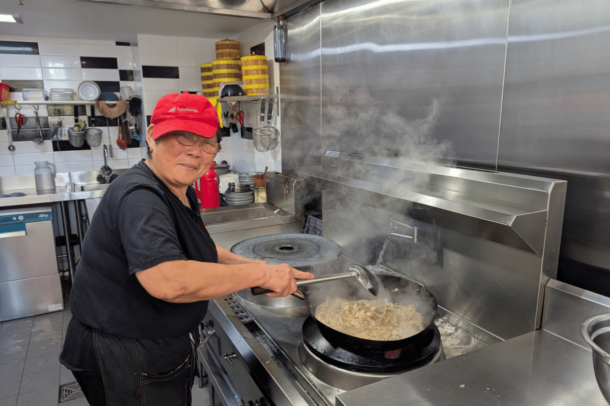 Mei Sun at the wok
