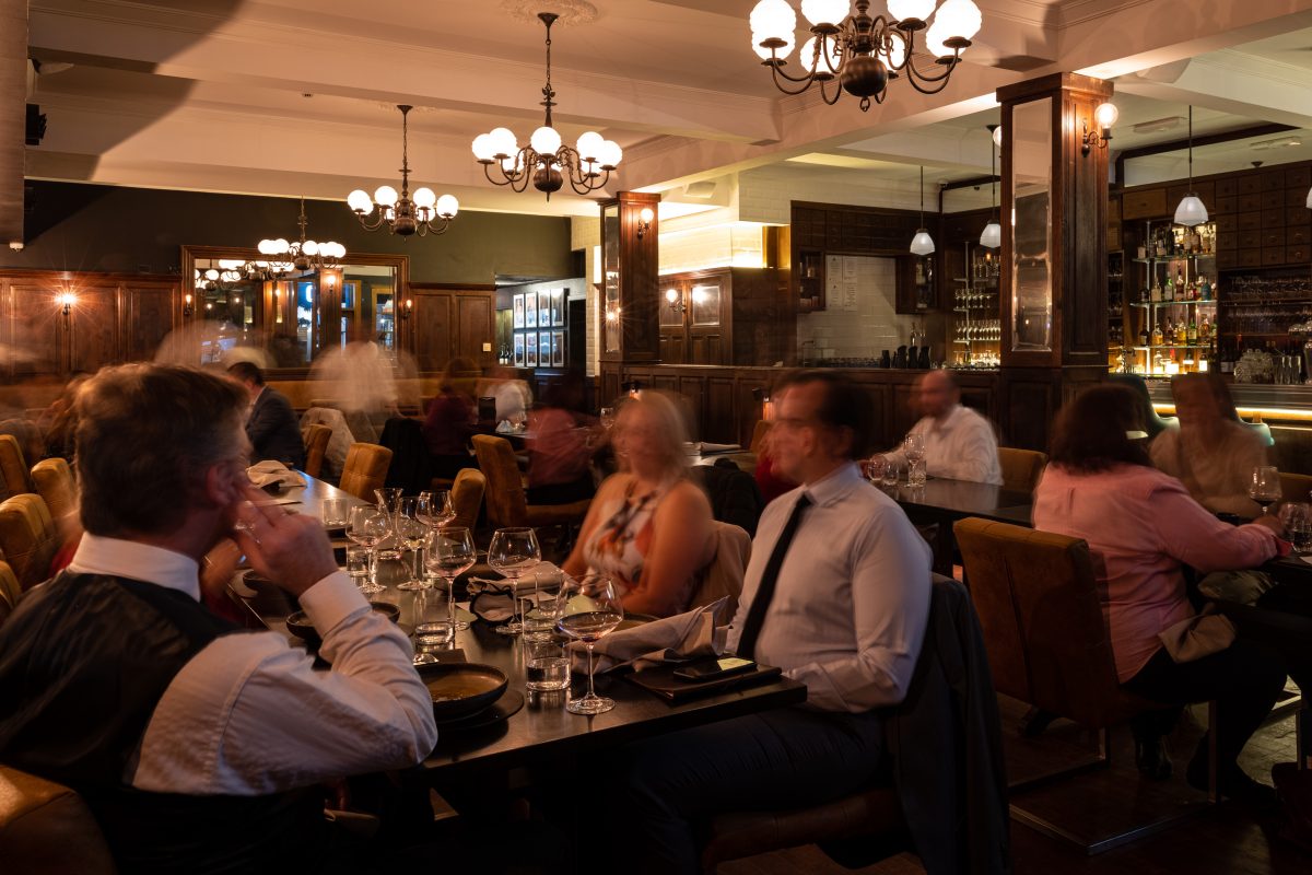 An artistically blurry photo of diners in a restaurant
