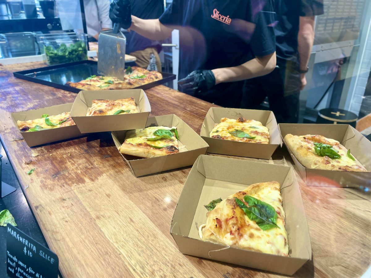 Pizza slices in boxes.