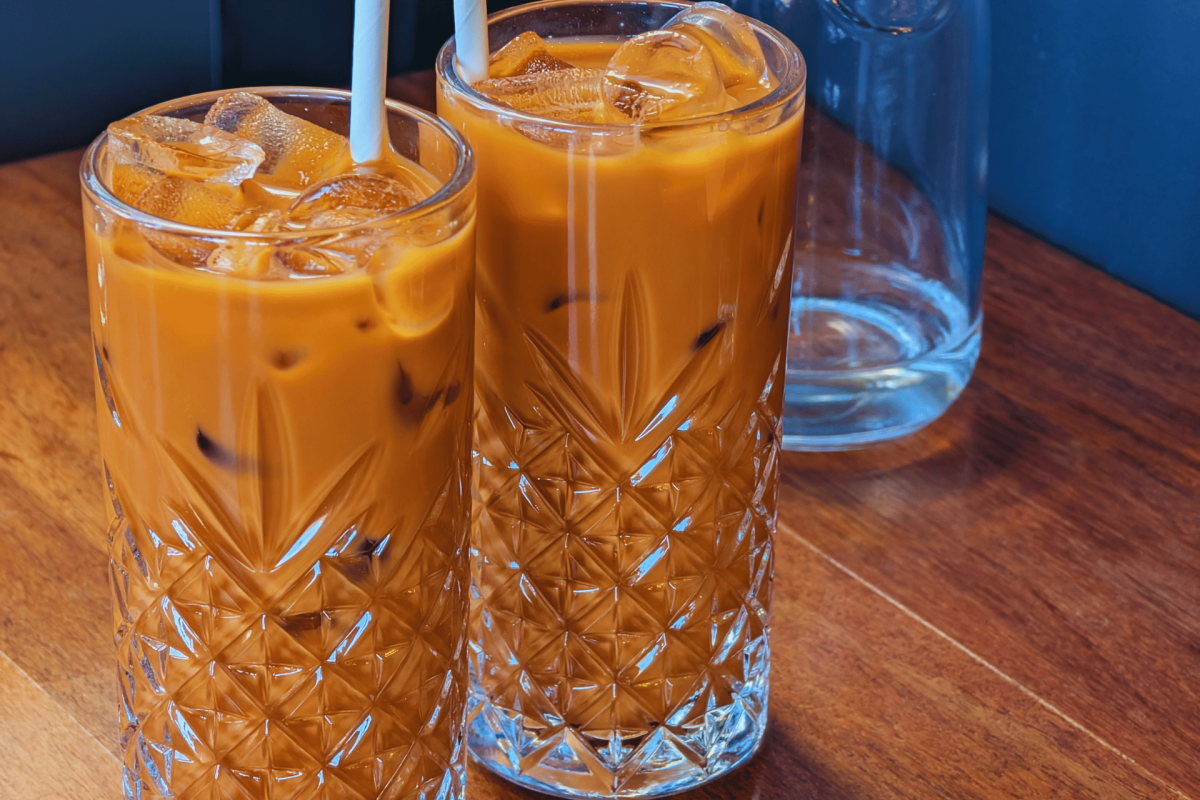 Two glasses of Thai milk tea.