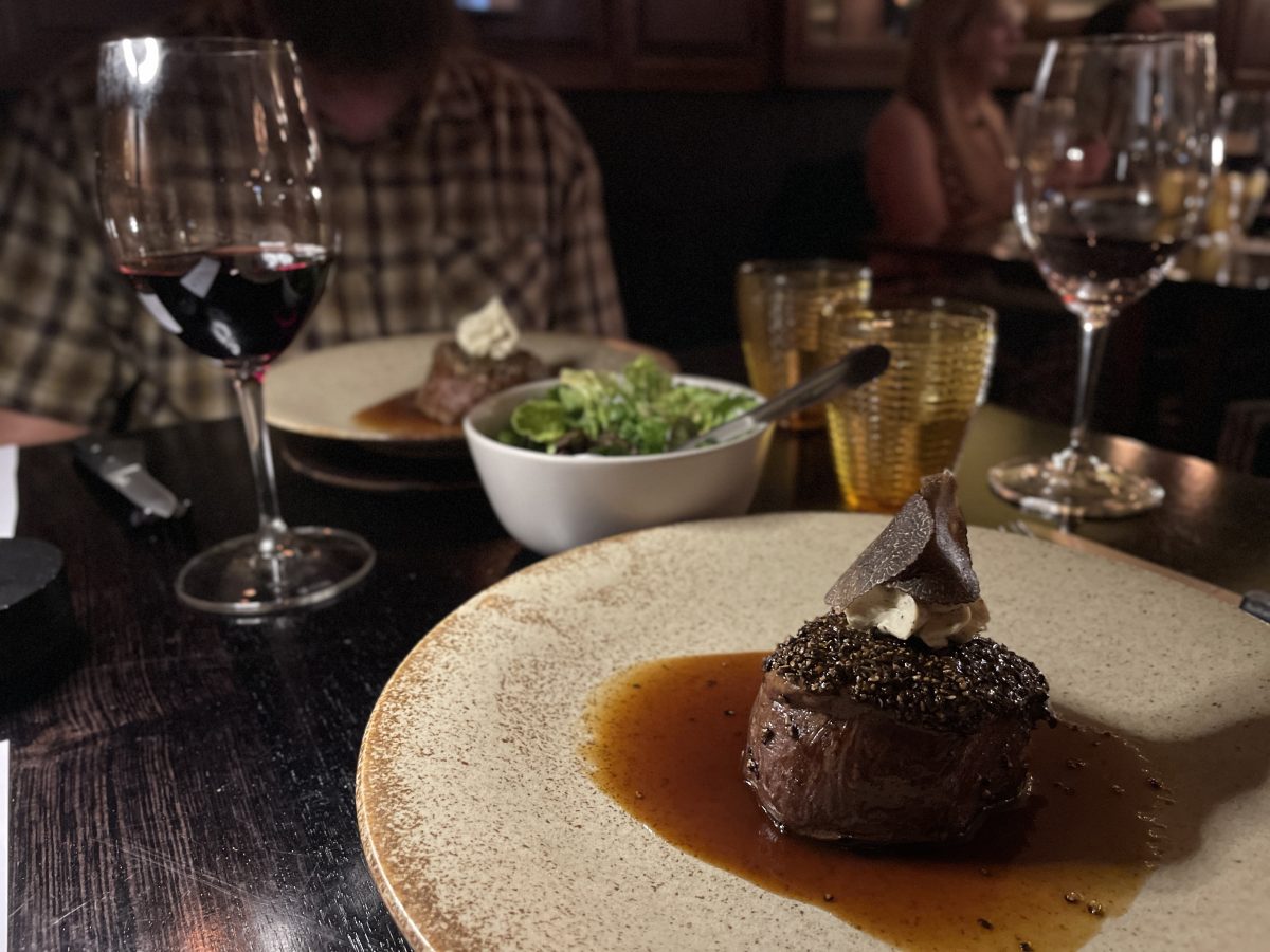 Pepper steak on a plate with truffle.