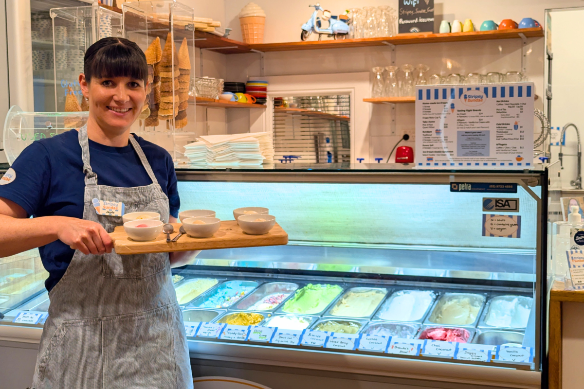 Woman holiday tasting board of ice cream.