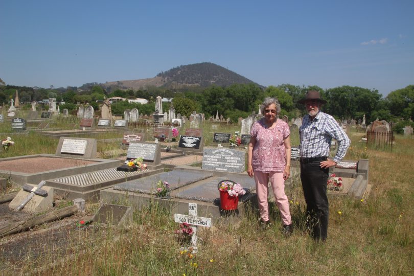 Placing flowers on graves