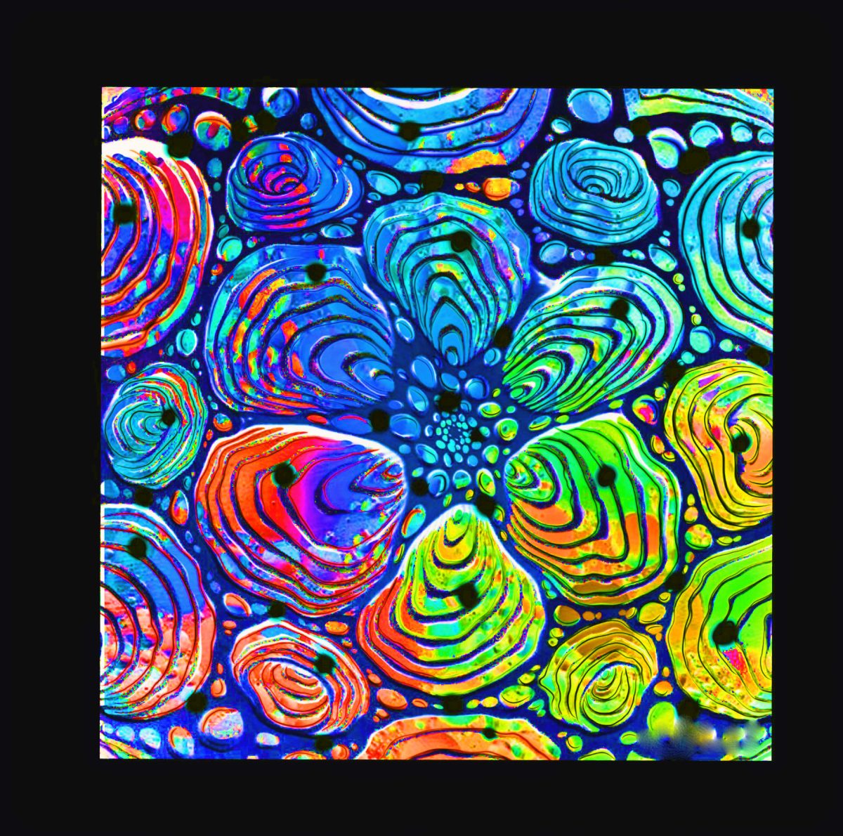 One of the art classes on offer during Rock Oyster Week is Paint in the Dark. It combines an art class using florescent paint under UV lighting, with oysters and wine.
