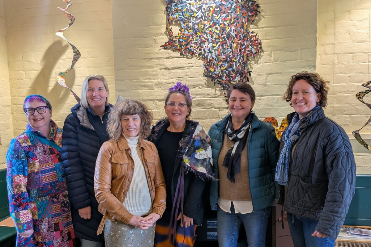 Group of women with artwork