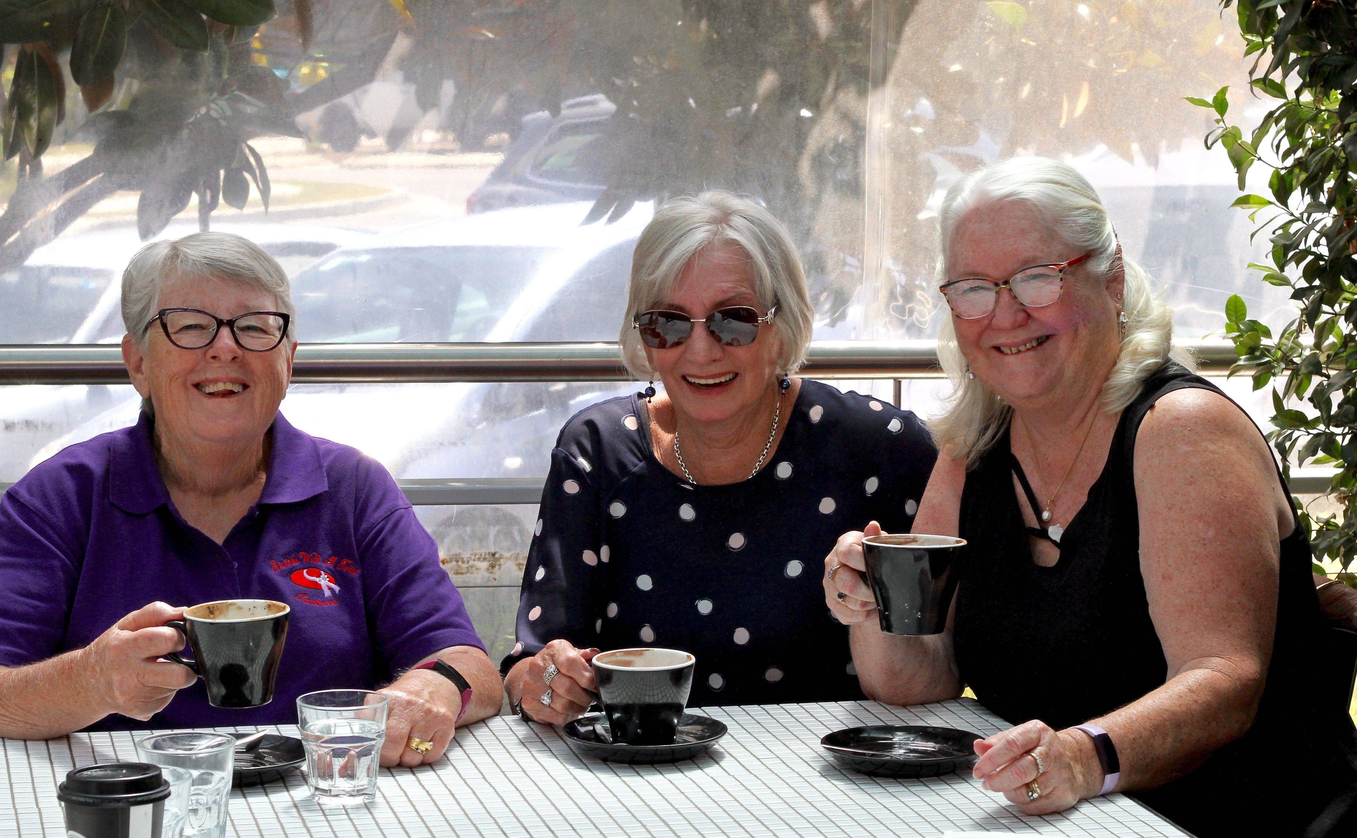 Red Hatters fit in with a splash of purple to connect women in Canberra