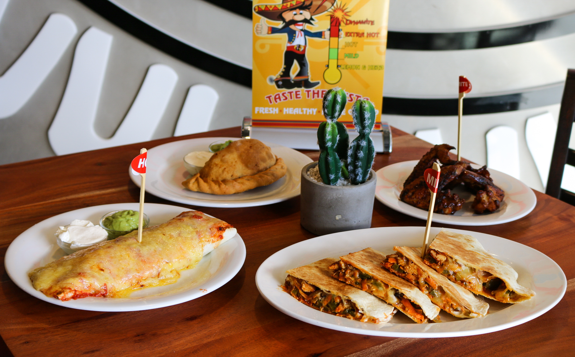 Hot in the City: Mochachos is dishing up flame-grilled chicken and Mexican food in Kingston