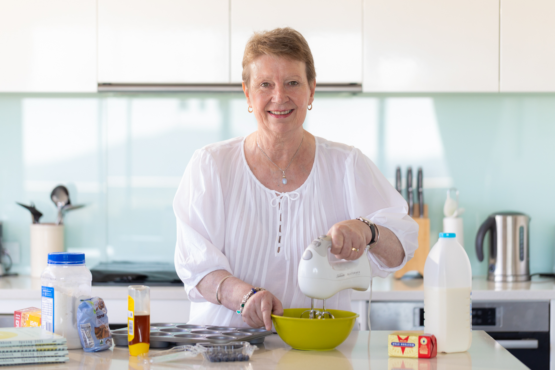 Meet the Canberra community that survived lockdown by creating a cookbook