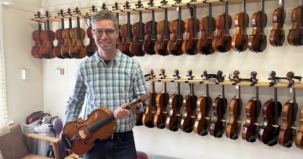 Odd jobs: Hugh left the public service more than two decades ago to become a 'luthier' ... a what now?