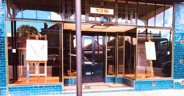 Why is there art in the window of this Braidwood shopfront?